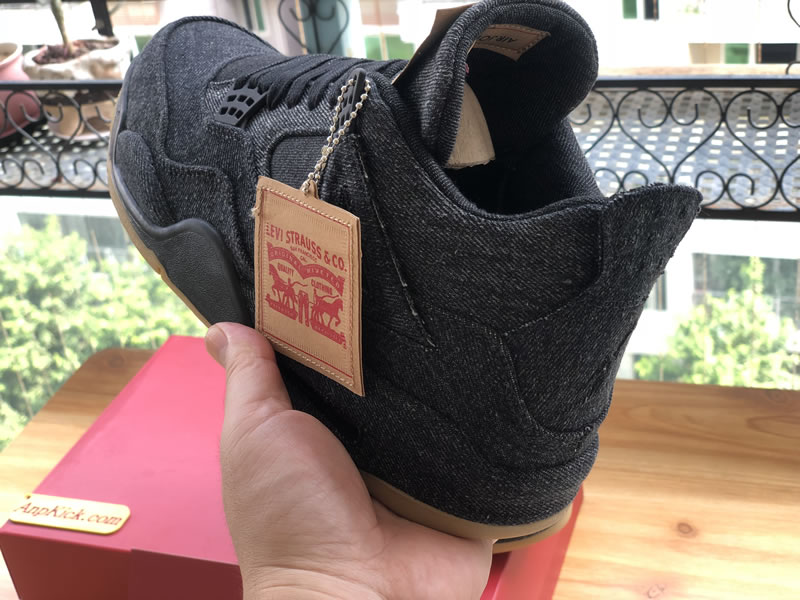 Levi's x Air Jordan 4 'Black Denim' In-Hand Behind Images