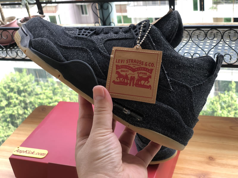 Levi's x Air Jordan 4 'Black Denim' In-Hand Side Images